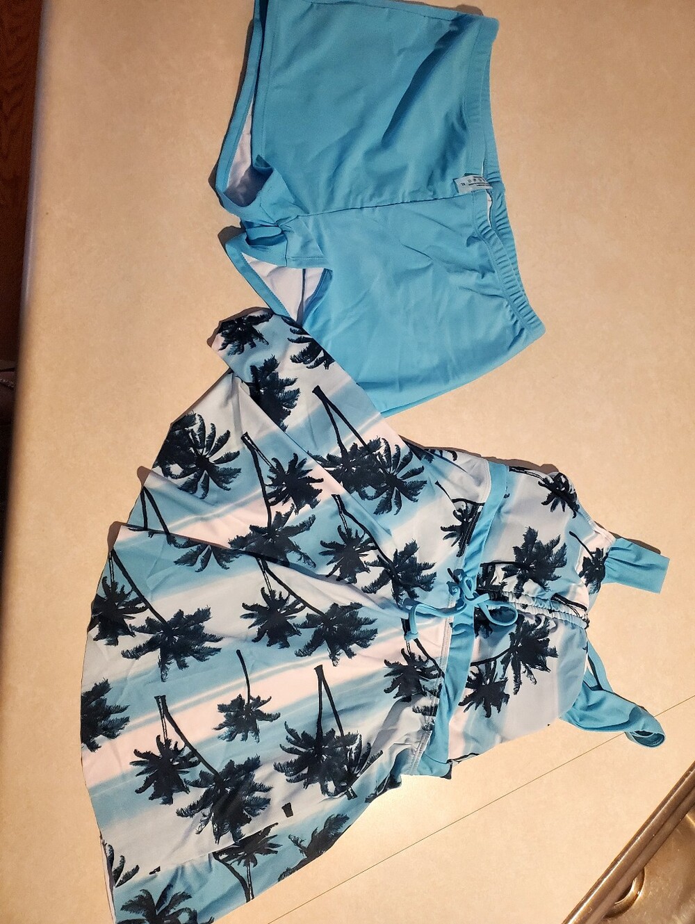 Women's Blue Palm-Print Swim Suit. Never Worn